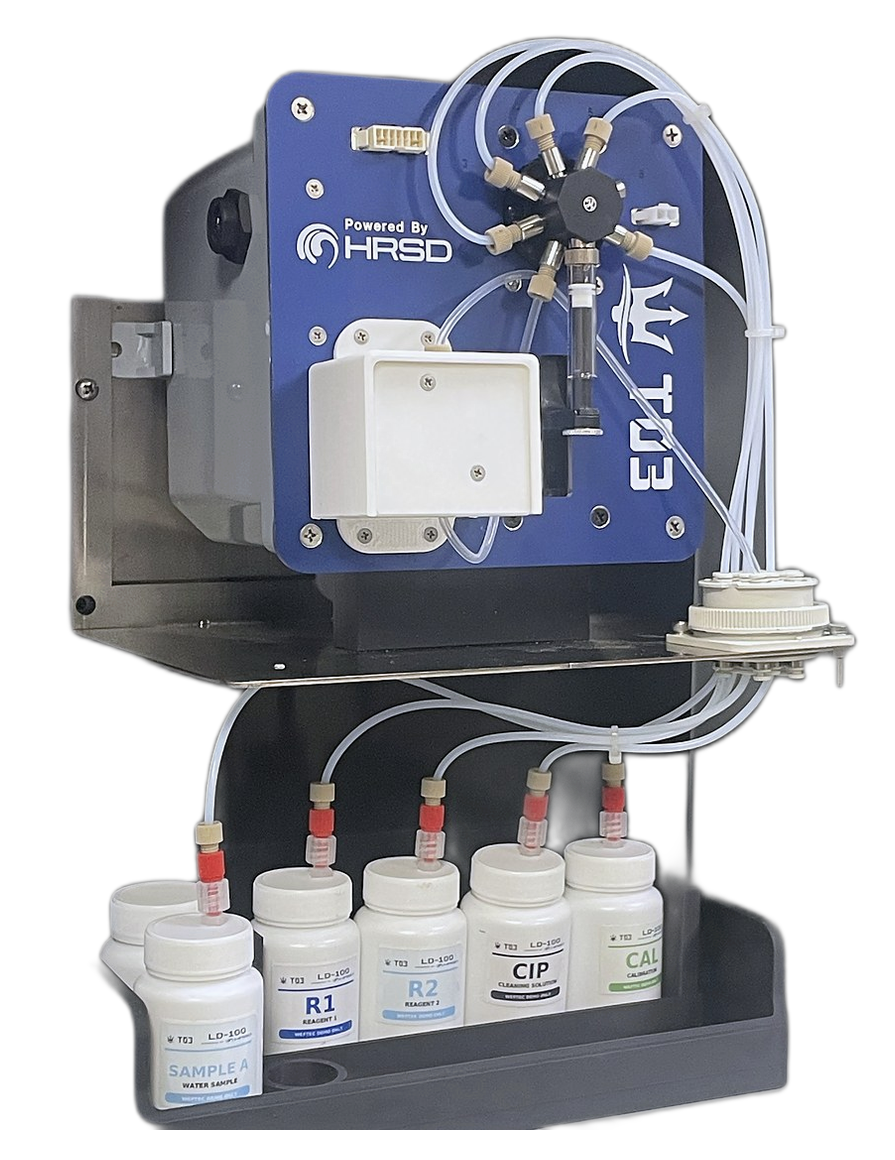 Inside the LD100: analytical module, valve assembly, and labeled reagent bottles